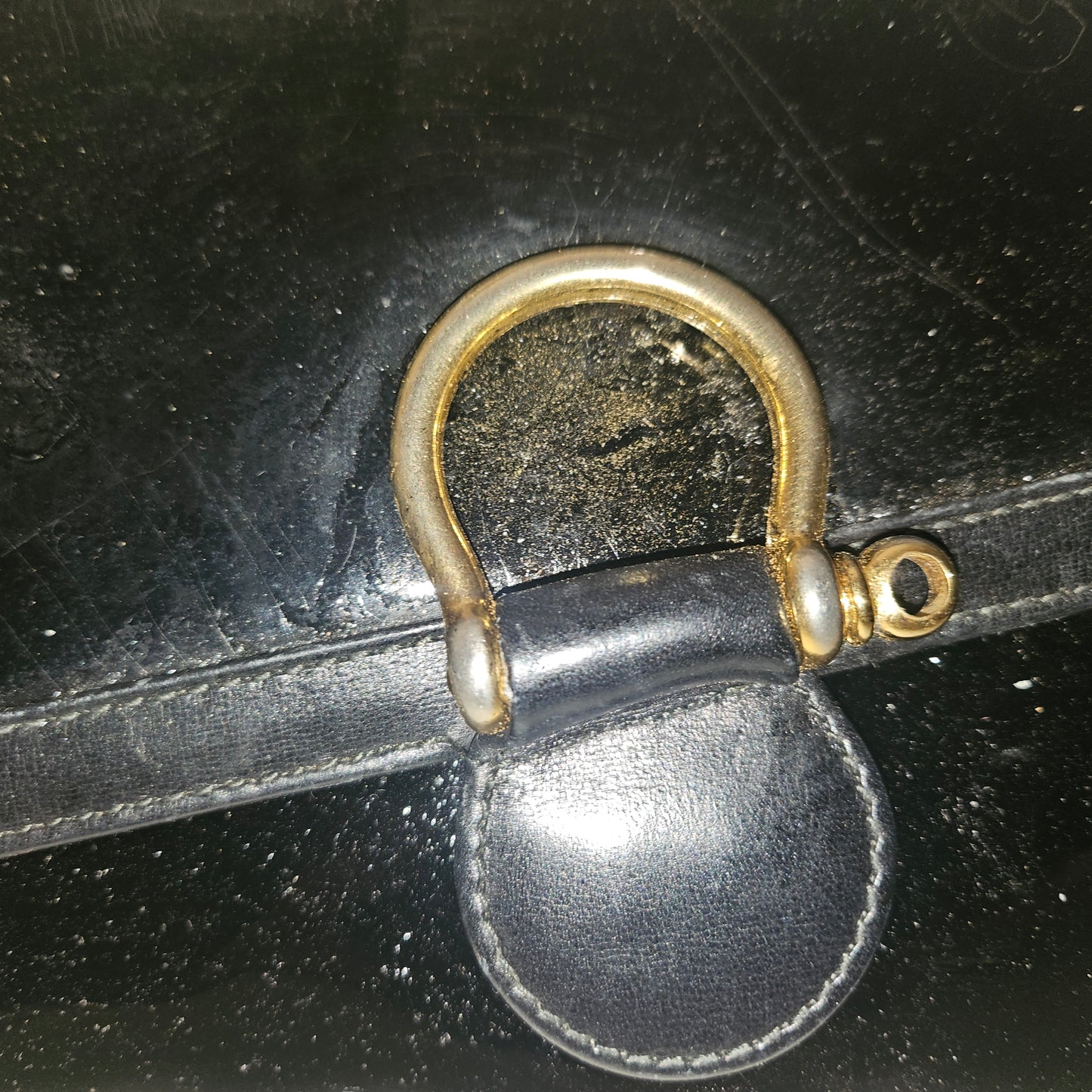 Gucci black patent leather XL asymmetrical envelope top clutch with a gold equestrian accent