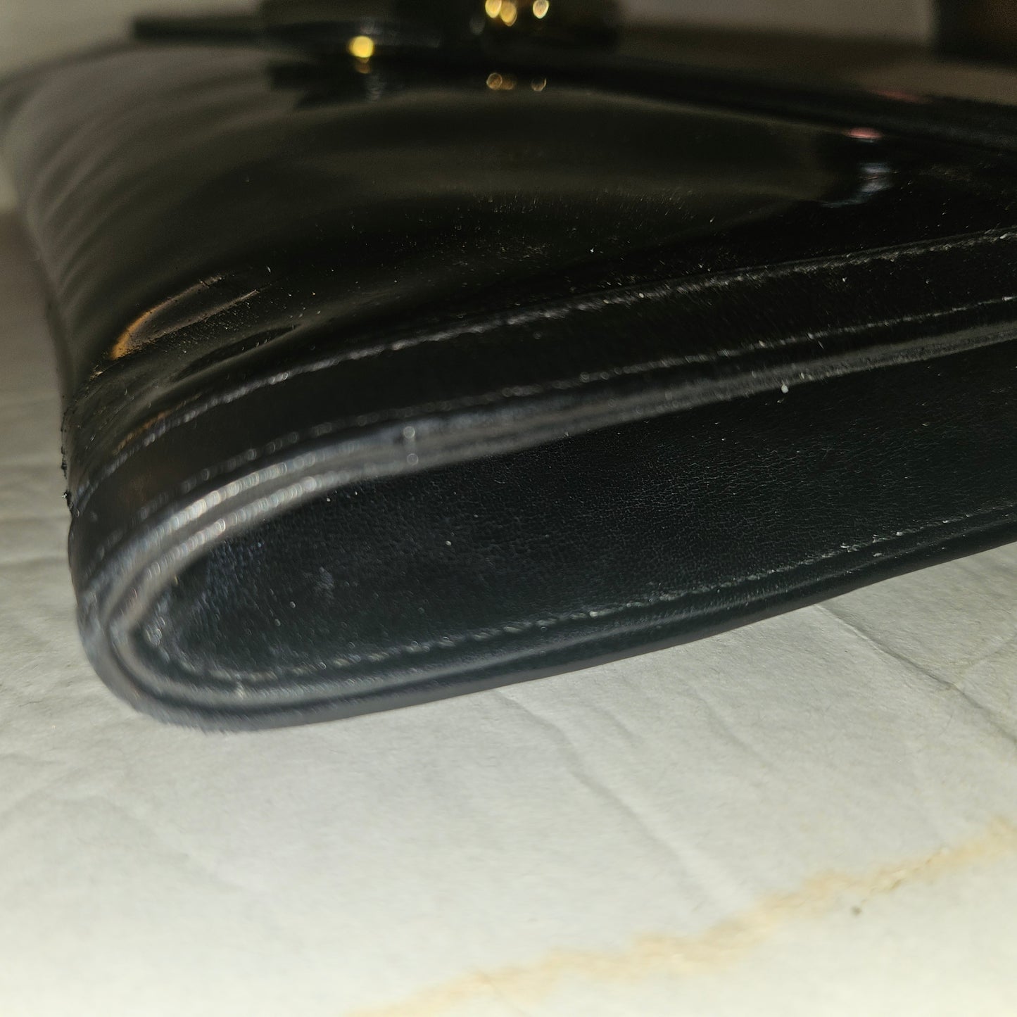 Gucci black patent leather XL asymmetrical envelope top clutch with a gold equestrian accent