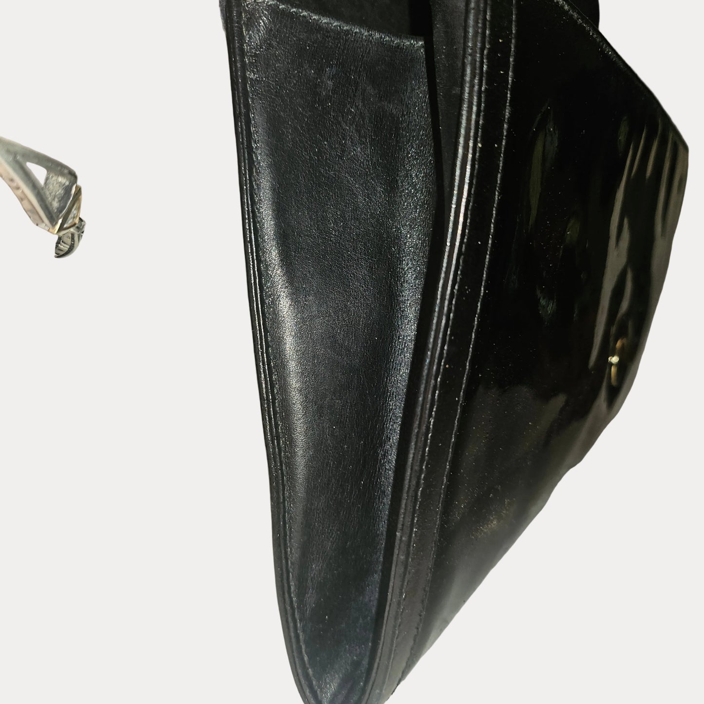 Gucci black patent leather XL asymmetrical envelope top clutch with a gold equestrian accent