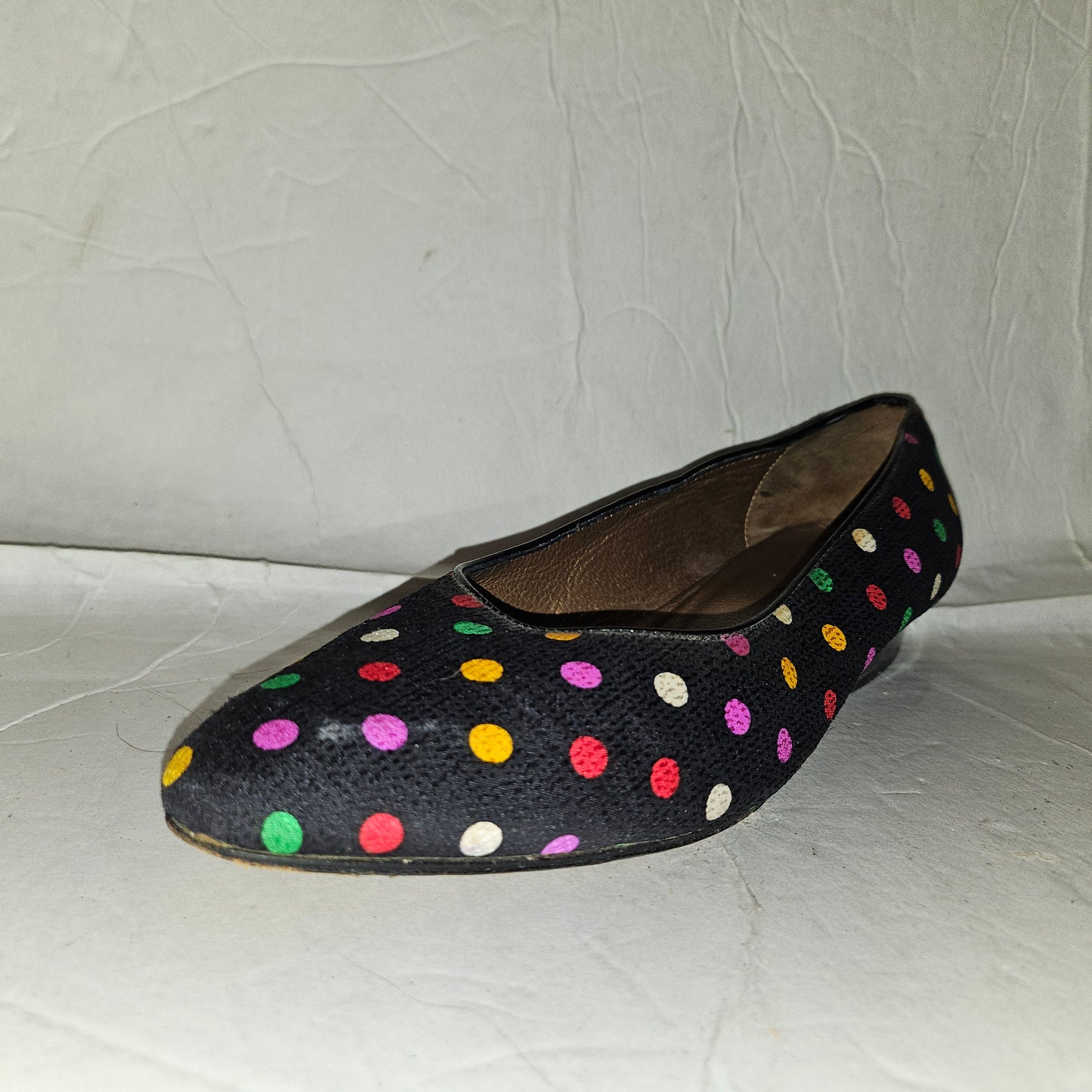 Yves Saint Laurent navy flats with multicolored polka dots