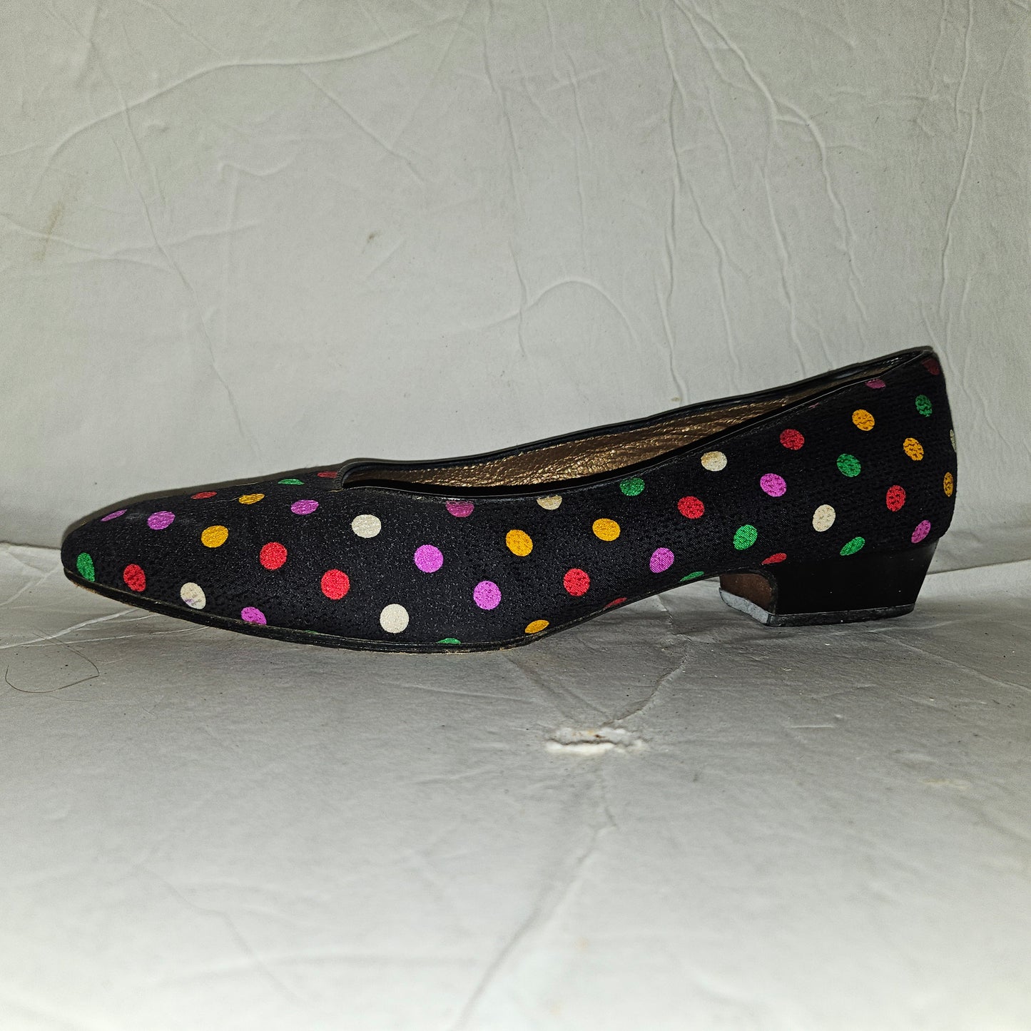 Yves Saint Laurent navy flats with multicolored polka dots