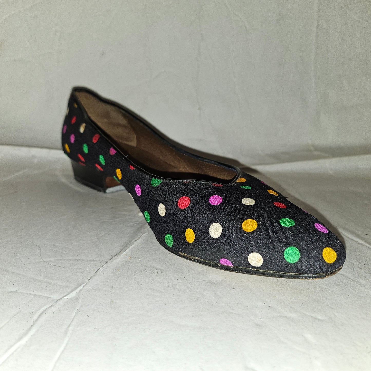 Yves Saint Laurent navy flats with multicolored polka dots