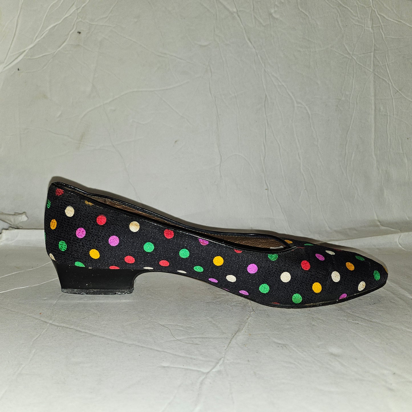 Yves Saint Laurent navy flats with multicolored polka dots