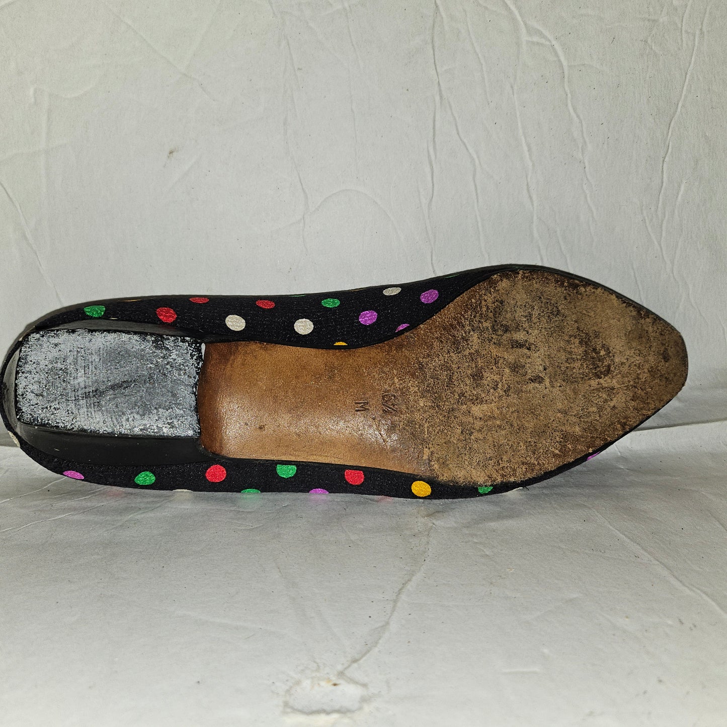 Yves Saint Laurent navy flats with multicolored polka dots