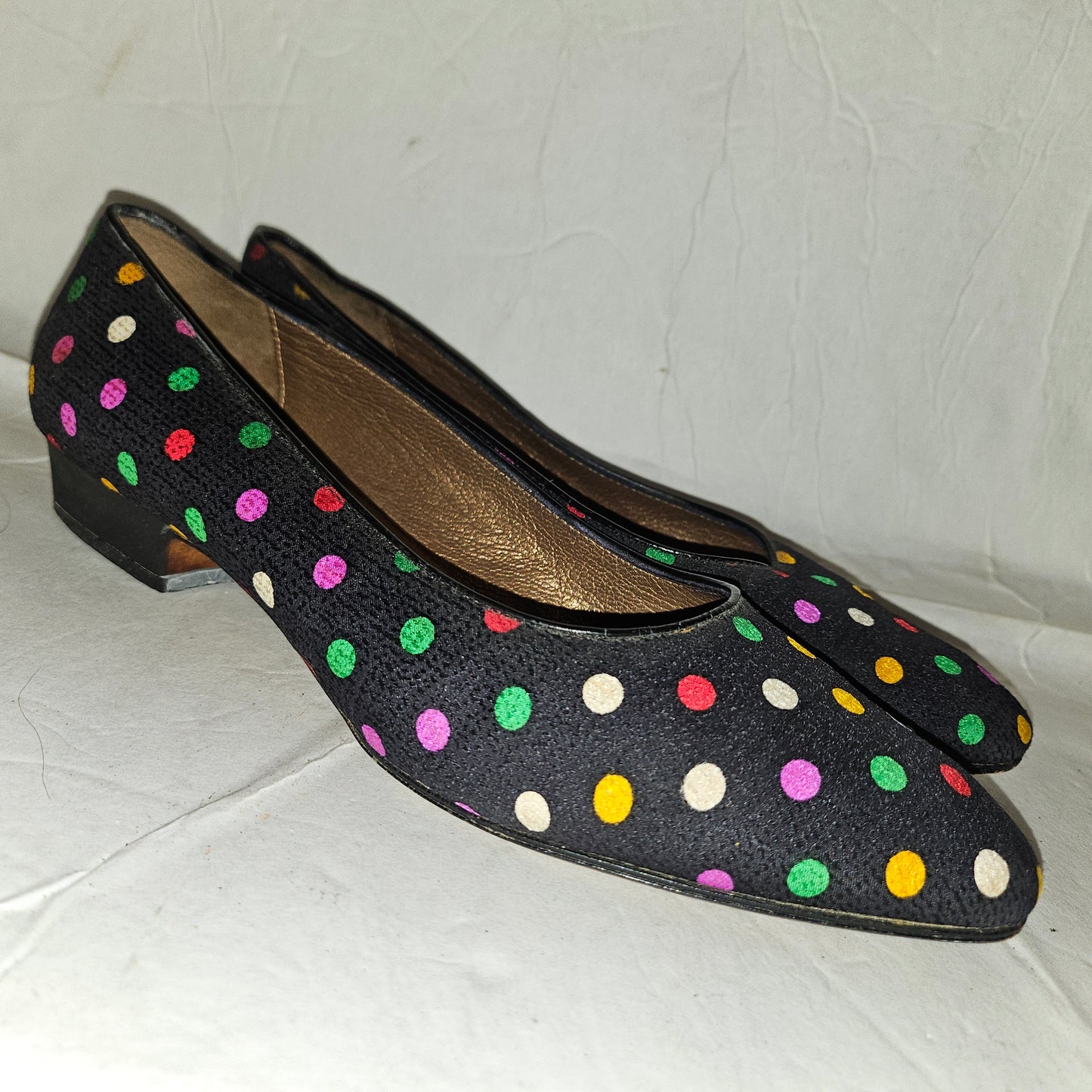 Yves Saint Laurent navy flats with multicolored polka dots