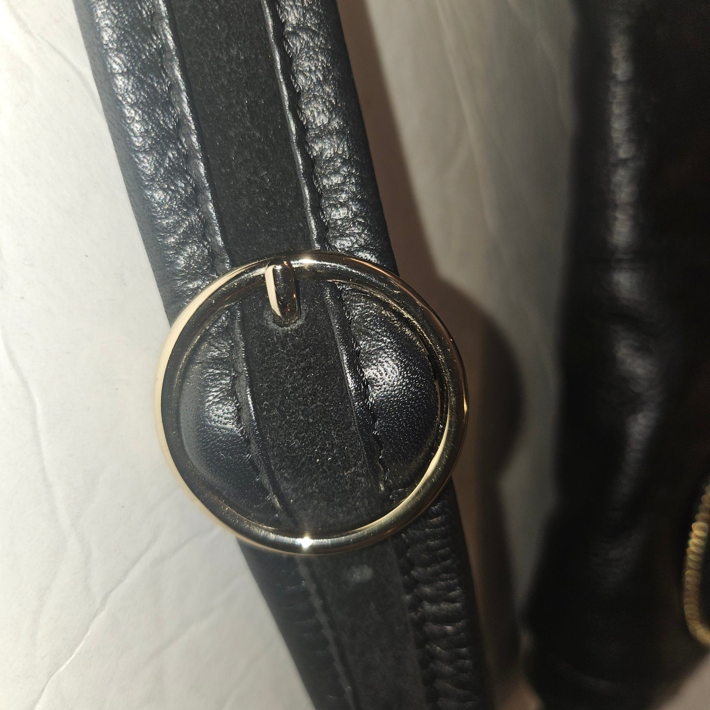 See By Chloe black pebbled leather saddle bag with two leather flowers