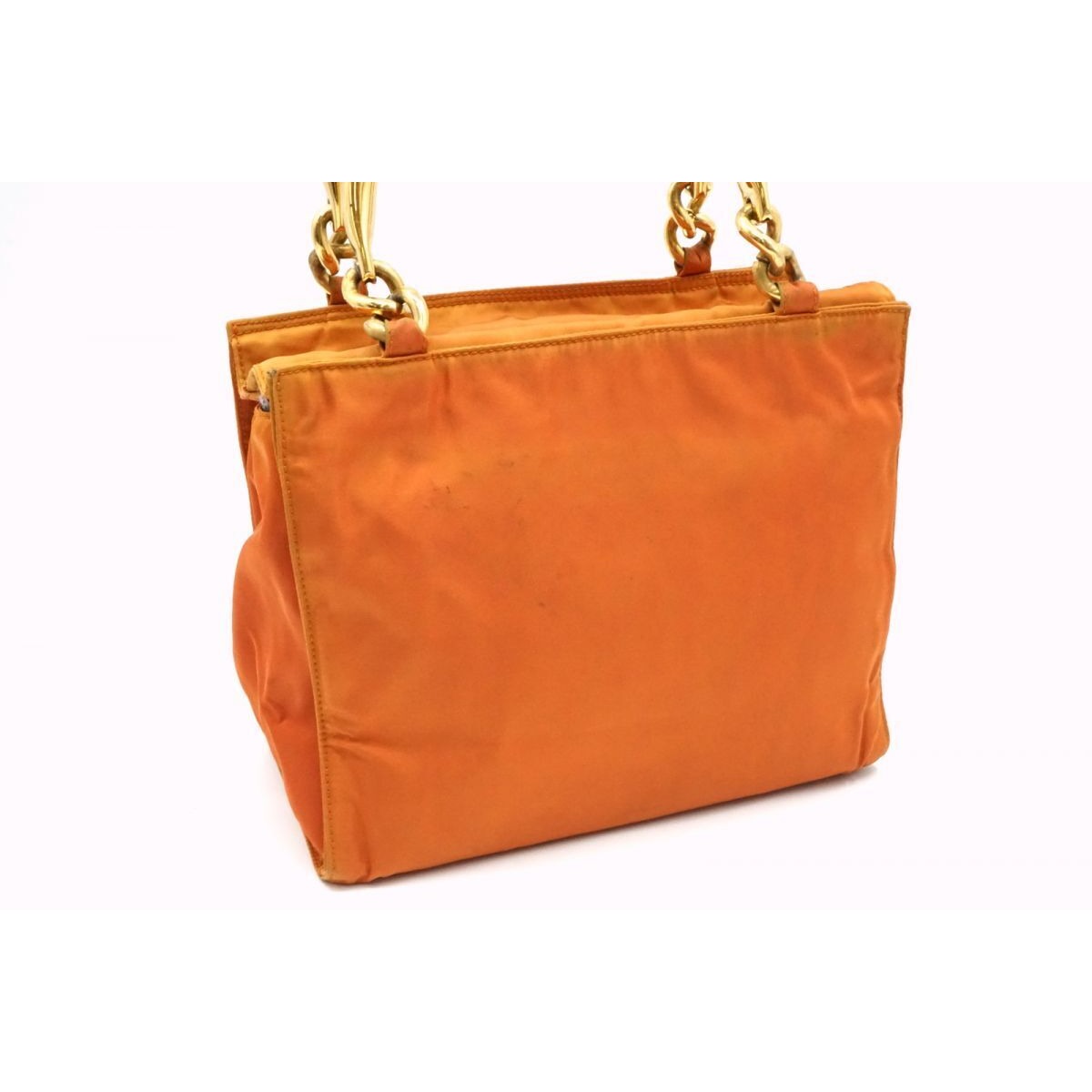 Prada orange re-edition 2000 satchel with gold metal handles