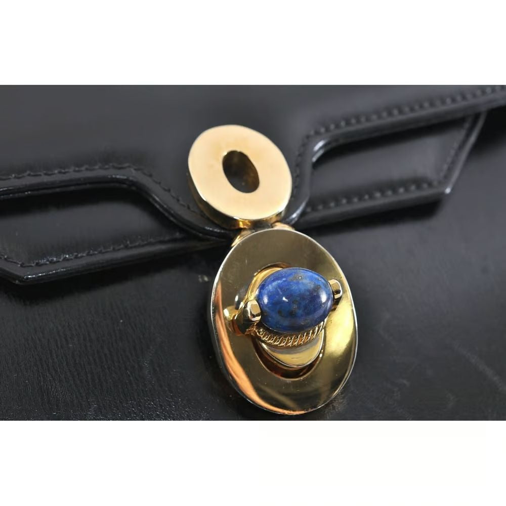 Unique 1960s Gucci mod, black leather, shoulder bag with a beautiful, blue, lapis lazuli accent on the clasp & bold gold hardware