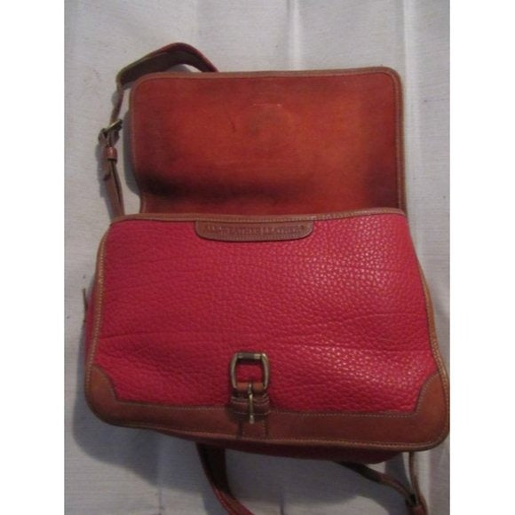 Vintage, Dooney and Bourke AWL, textured red leather and smooth camel leather, envelope top, cross body or shoulder bag with a removable adjustable strap, exterior pockets, brass accents