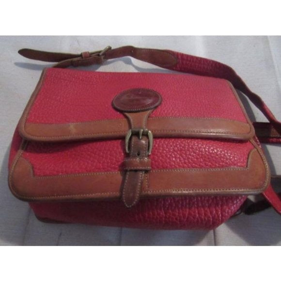 Vintage, Dooney and Bourke AWL, textured red leather and smooth camel leather, envelope top, cross body or shoulder bag with a removable adjustable strap, exterior pockets, brass accents