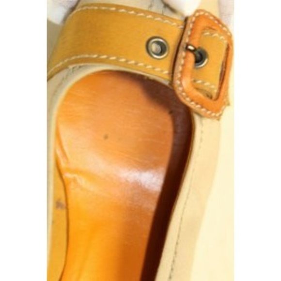 Miu Miu, size EU 39.5/9.5B US, khaki canvas and orange leather, squared, pointy toe, heels with 2" kitten heels, square, orange leather and chrome buckles, wood look heels, and chrome hardware