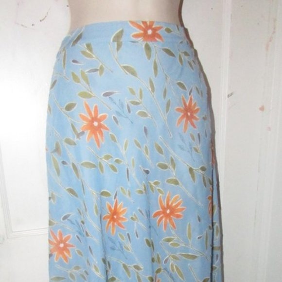 NWT, Moschino, size 46 IT/12 US, periwinkle, midi A-line skirt with stylized orange & green floral print