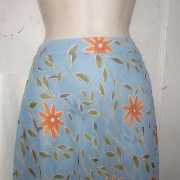 NWT, Moschino, size 46 IT/12 US, periwinkle, midi A-line skirt with stylized orange & green floral print