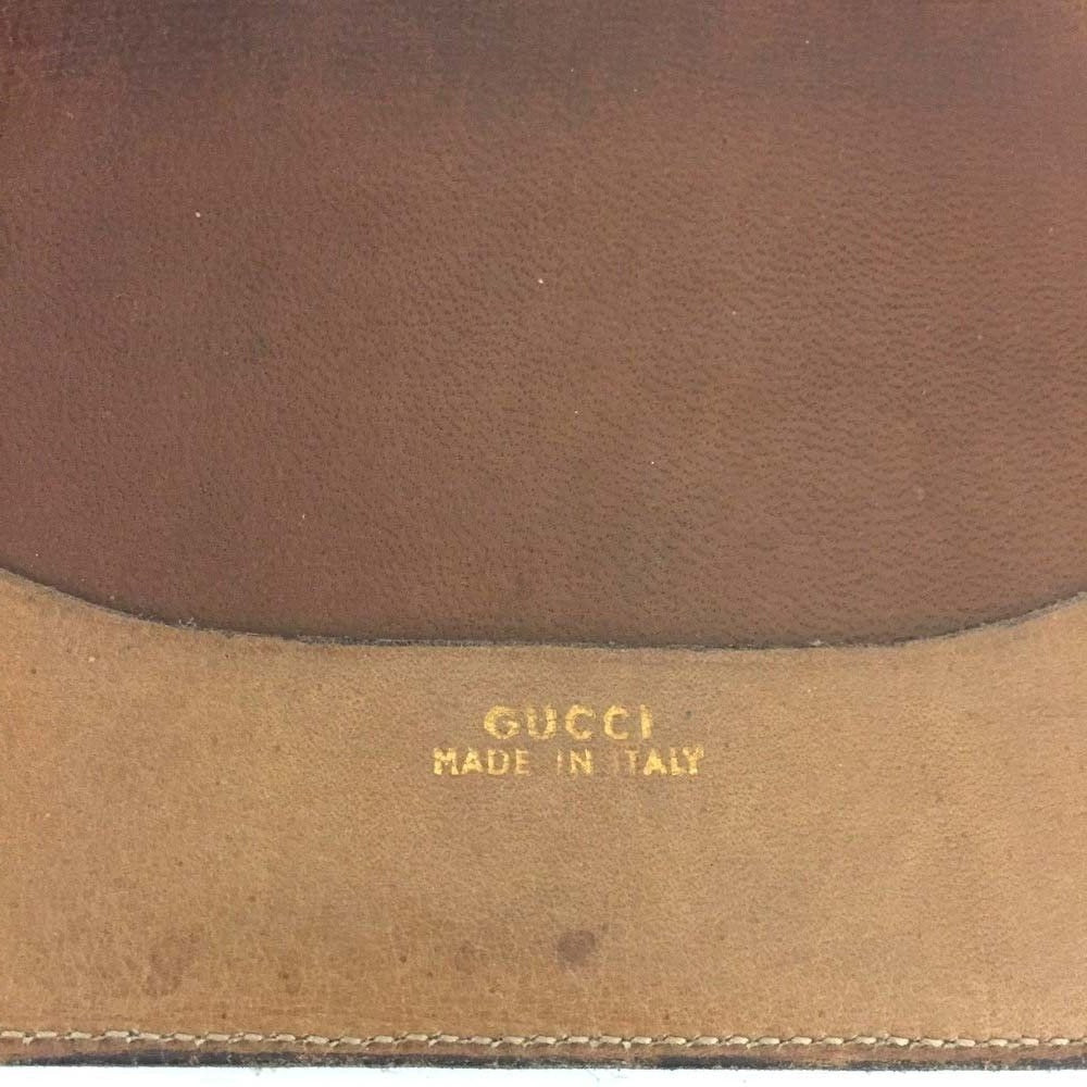 Early Gucci brown canvas with an orange diagonal GG logo print and camel leather bi-fold wallet