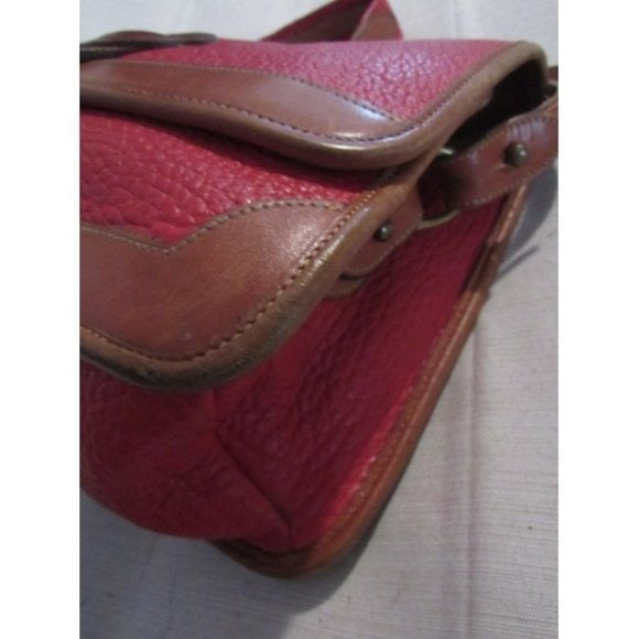 Vintage, Dooney and Bourke AWL, textured red leather and smooth camel leather, envelope top, cross body or shoulder bag with a removable adjustable strap, exterior pockets, brass accents