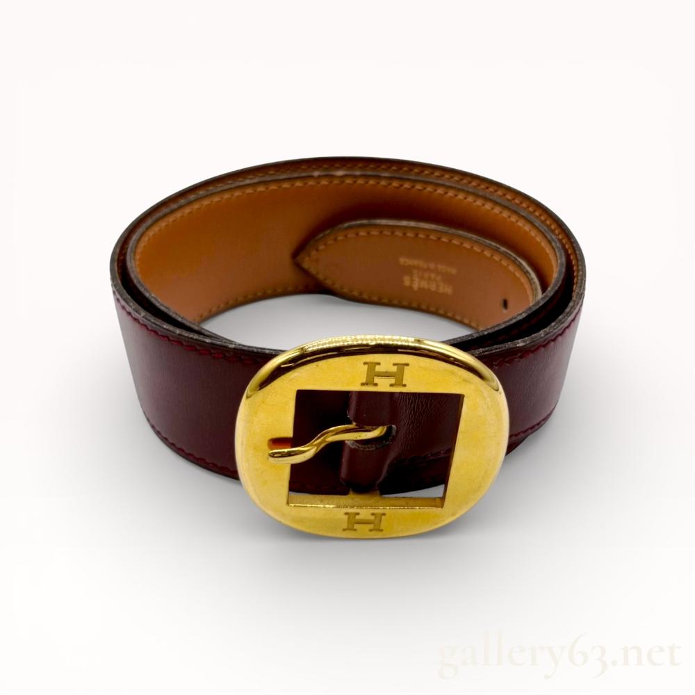 Hermes burgundy leather bet with gold engraved buckle