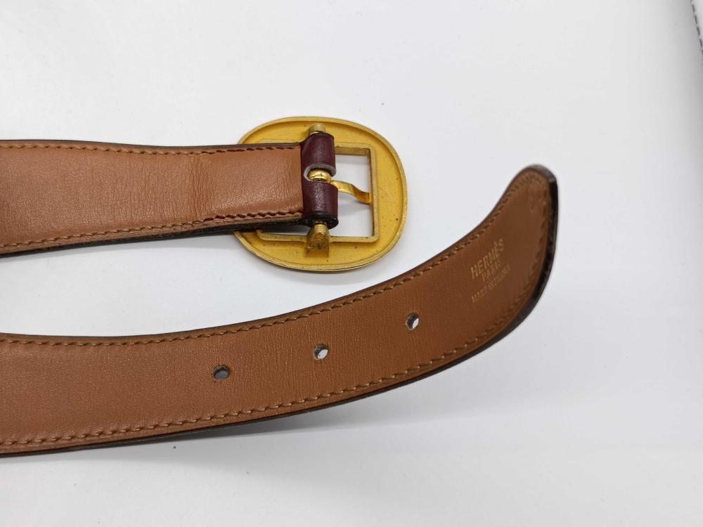 Hermes burgundy leather bet with gold engraved buckle
