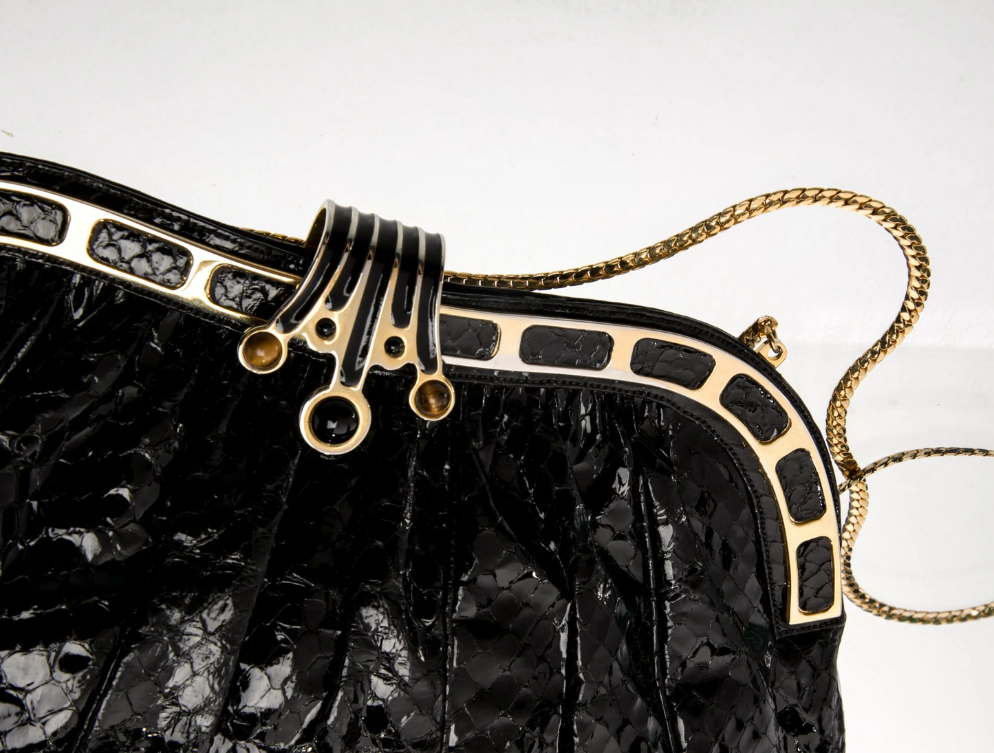 Judith Lieber black snakeskin two-way purse with tiger's eye & onyx