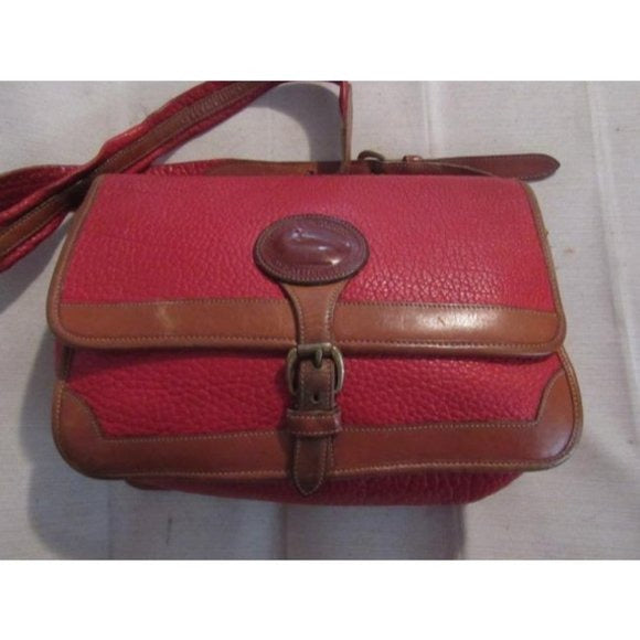 Vintage, Dooney and Bourke AWL, textured red leather and smooth camel leather, envelope top, cross body or shoulder bag with a removable adjustable strap, exterior pockets, brass accents