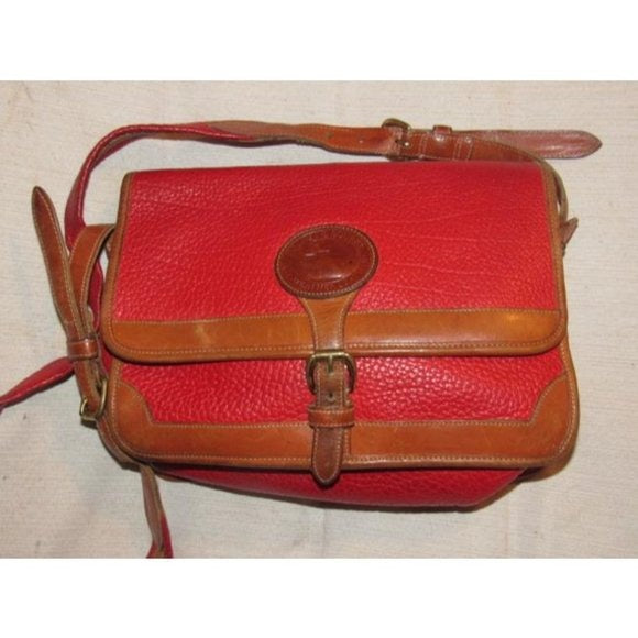 Vintage, Dooney and Bourke AWL, textured red leather and smooth camel leather, envelope top, cross body or shoulder bag with a removable adjustable strap, exterior pockets, brass accents