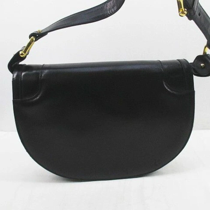 'Cosci' by Gucci black leather two way saddle bag with gold equestrian accents