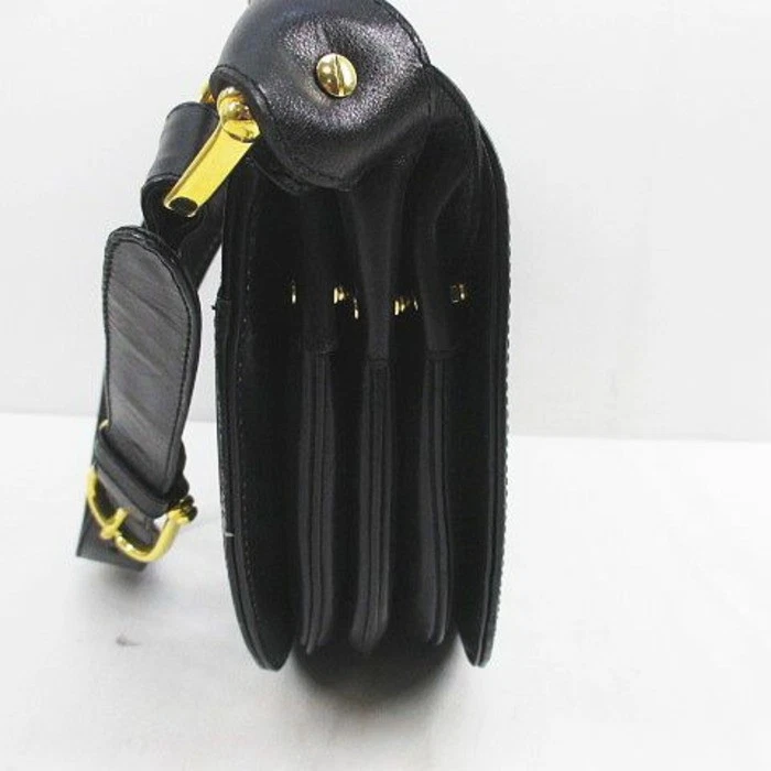 'Cosci' by Gucci black leather two way saddle bag with gold equestrian accents