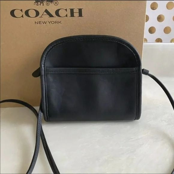 Vintage Coach, 'Hadley' line, hobo style purse in a black buttery soft leather, with a long strap and brass accents