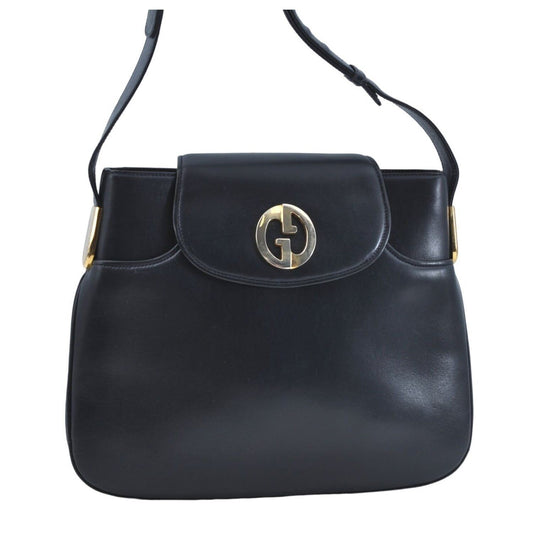 Gucci 1973 navy leather roomy handbag with a gold GG snap