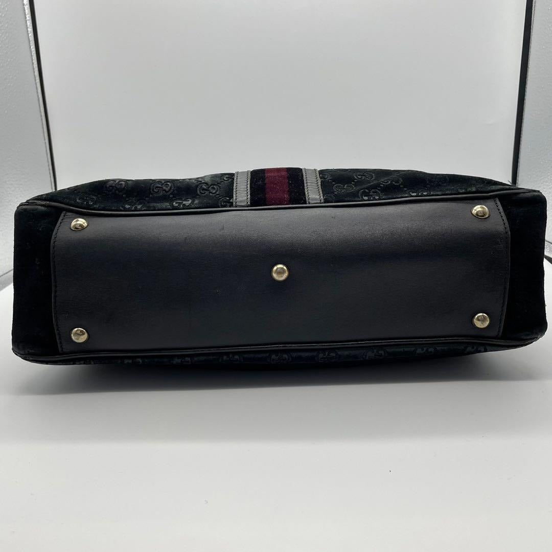 Gucci metallic G on black suede satchel w red & blue stripe