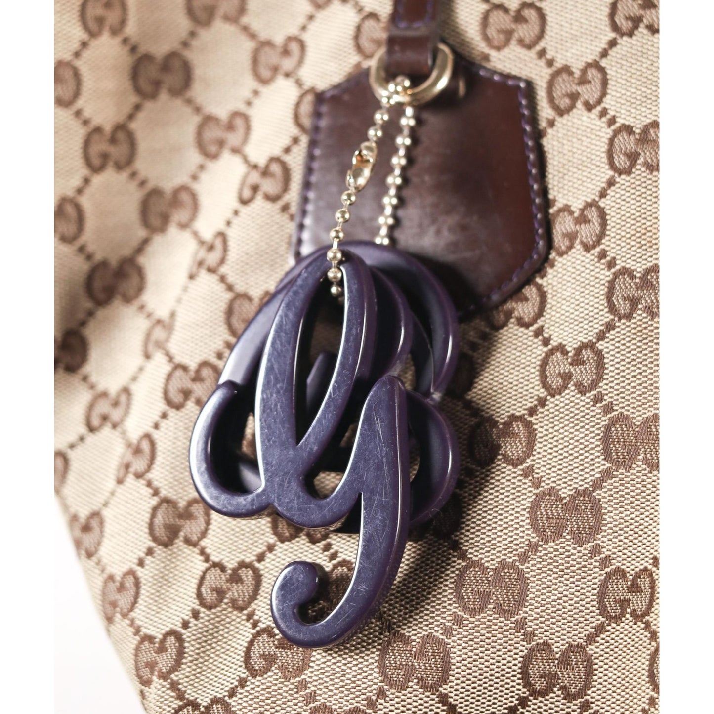 Louisa Gucci brown Guccissima satchel/tote w purple resin logo charm