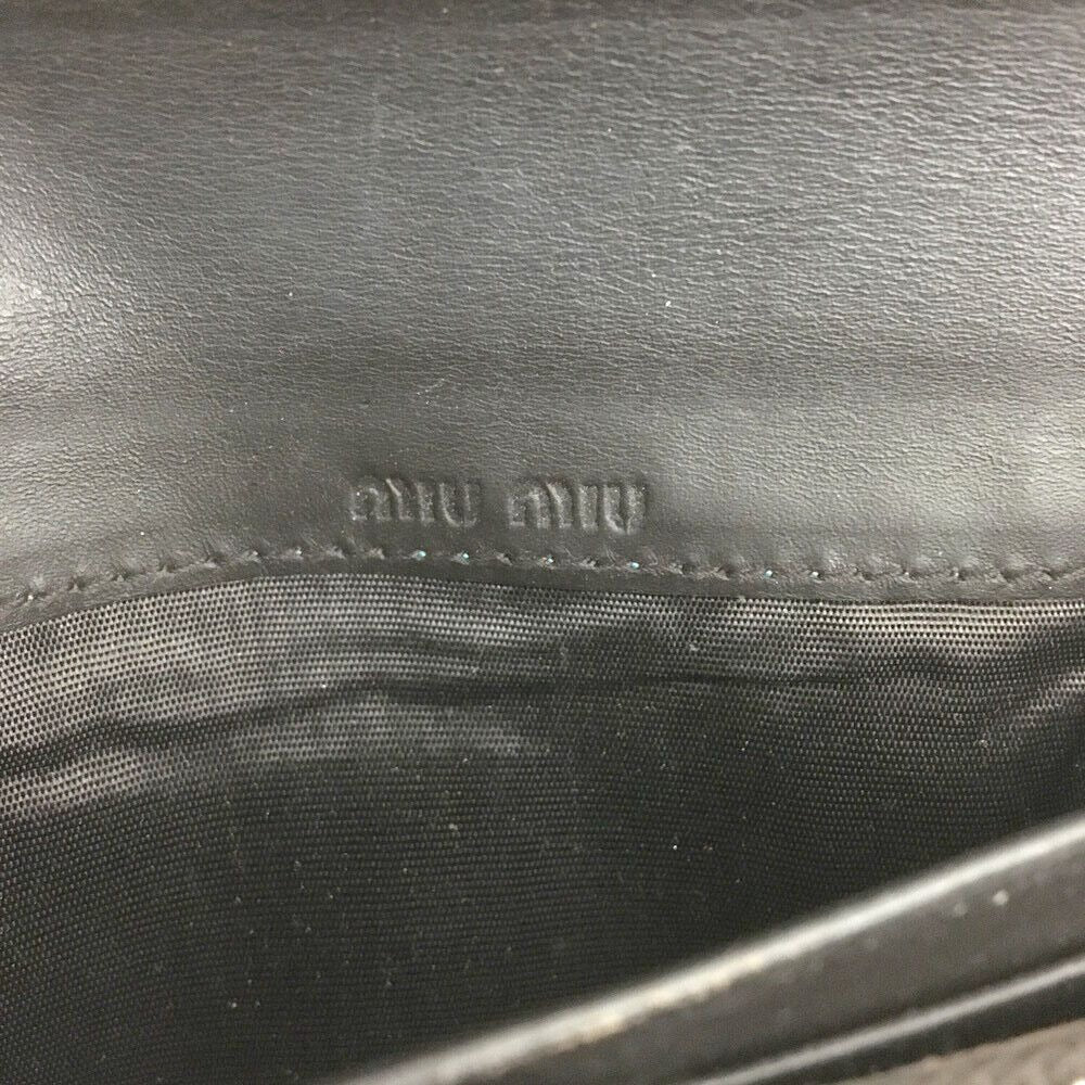 SALE- Miu Miu brown ostrich leather bi-fold style XL wallet