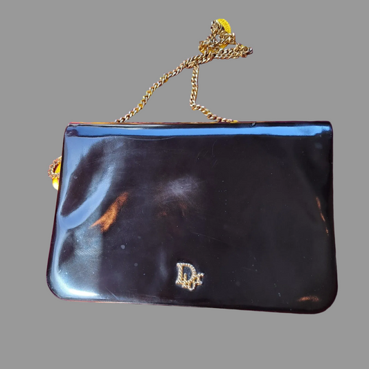 Dior shiny black leather two way envelope purse with a gold chain strap