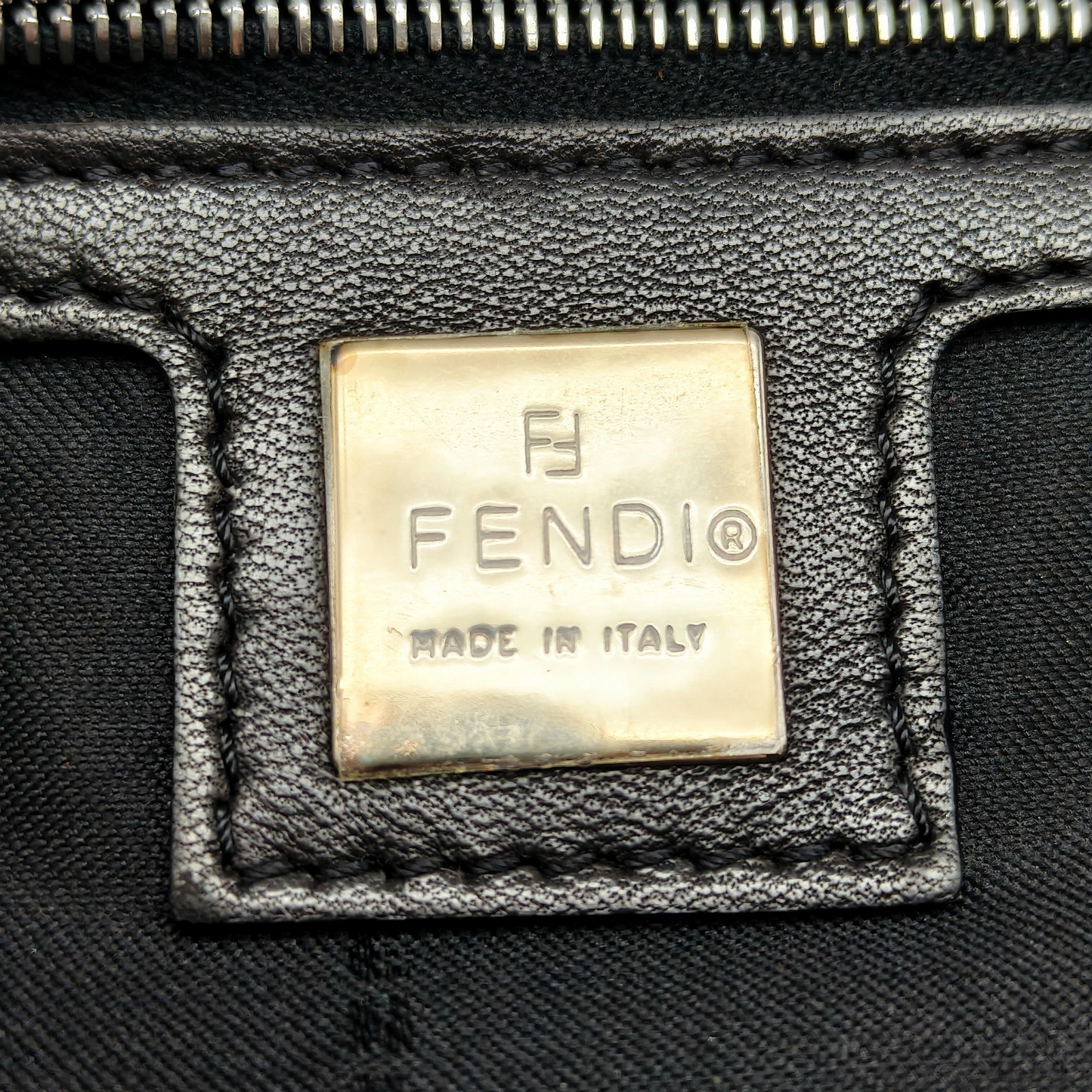 Fendi black crescent shaped baguette bag with chrome hardware - Iconic!