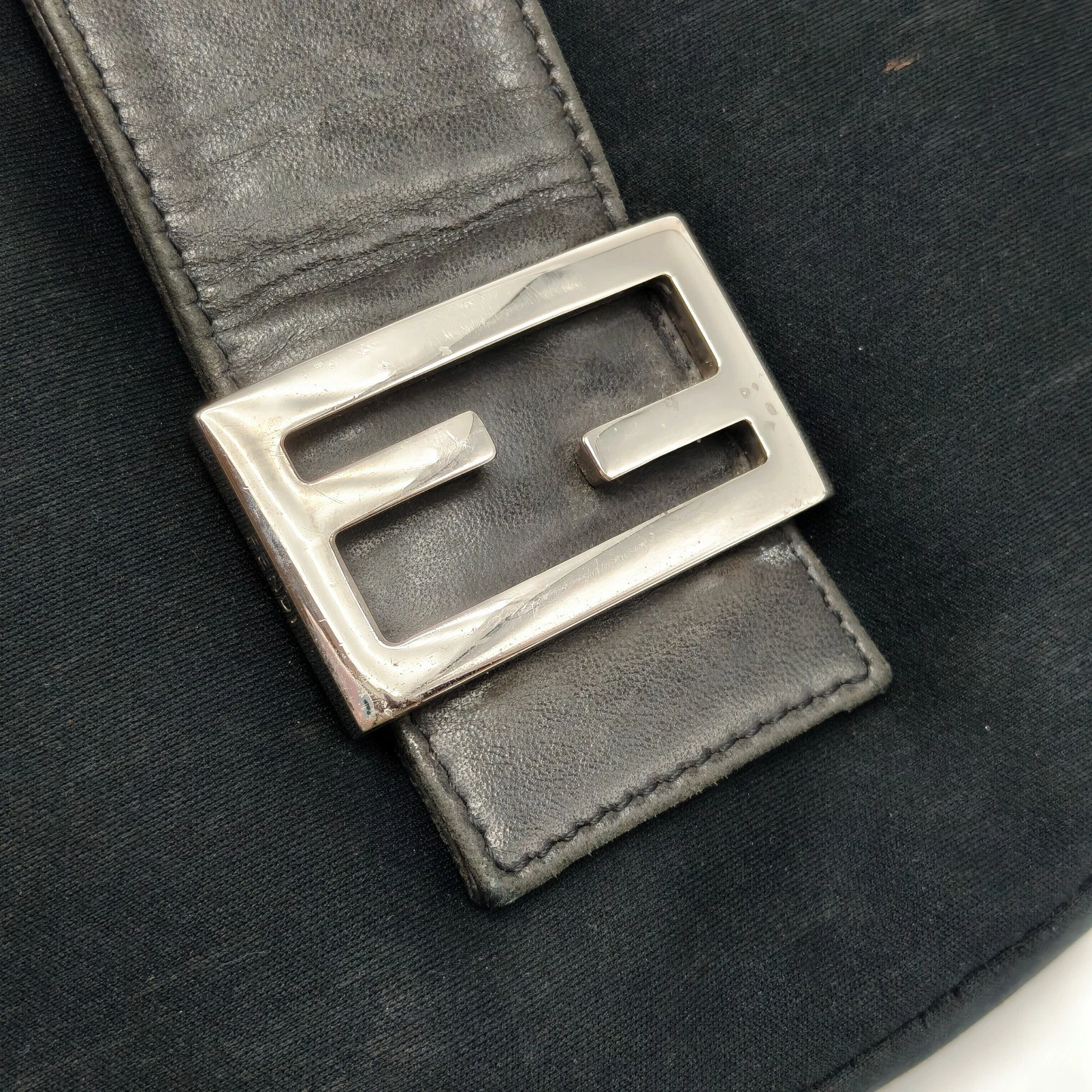 Fendi black crescent shaped baguette bag with chrome hardware - Iconic!