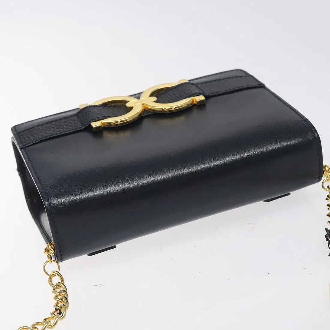 Ferragamo navy leather mini crossbody or belt bag w double Gancini & chain strap