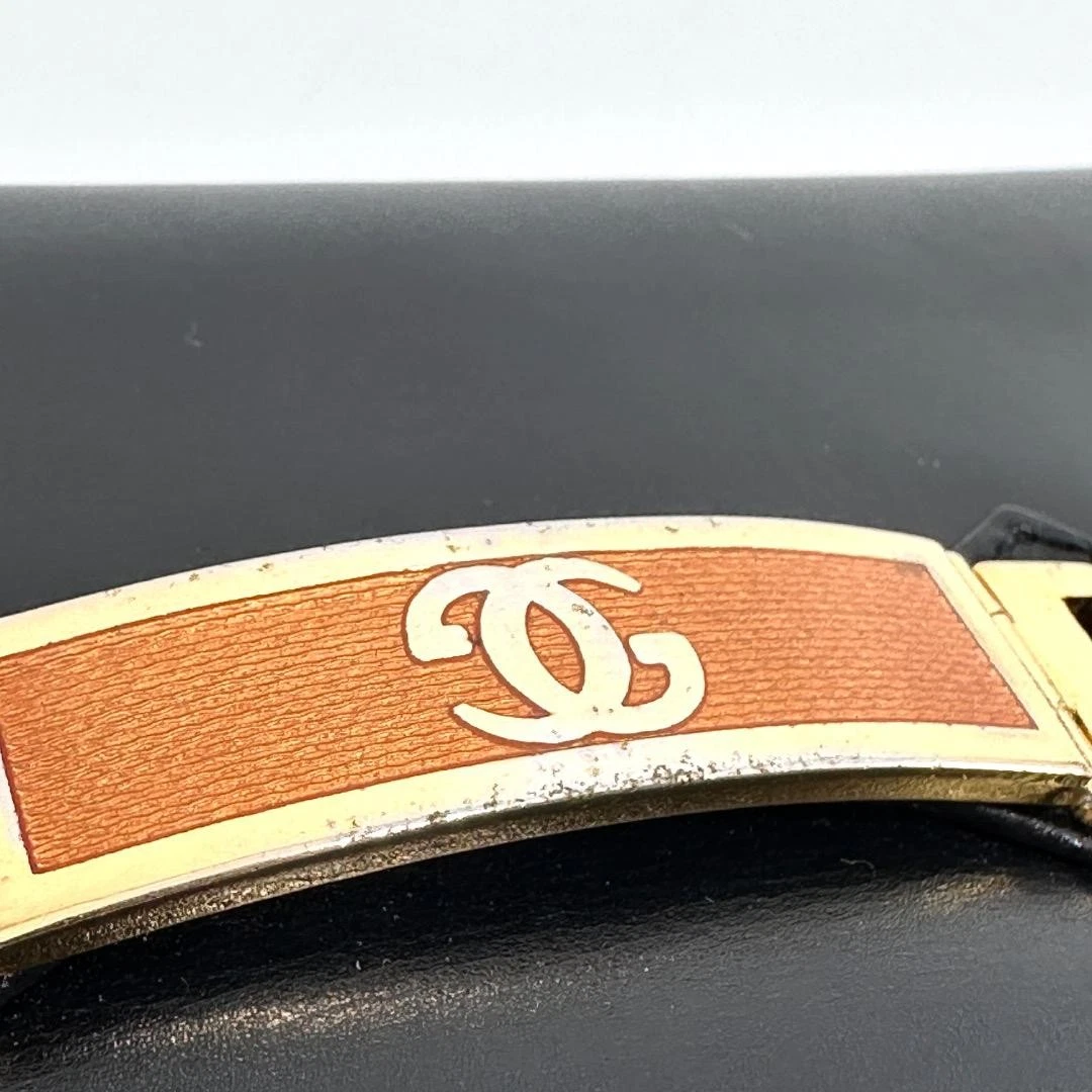 Gucci black leather two-way  mini purse with a yellow enamel clasp