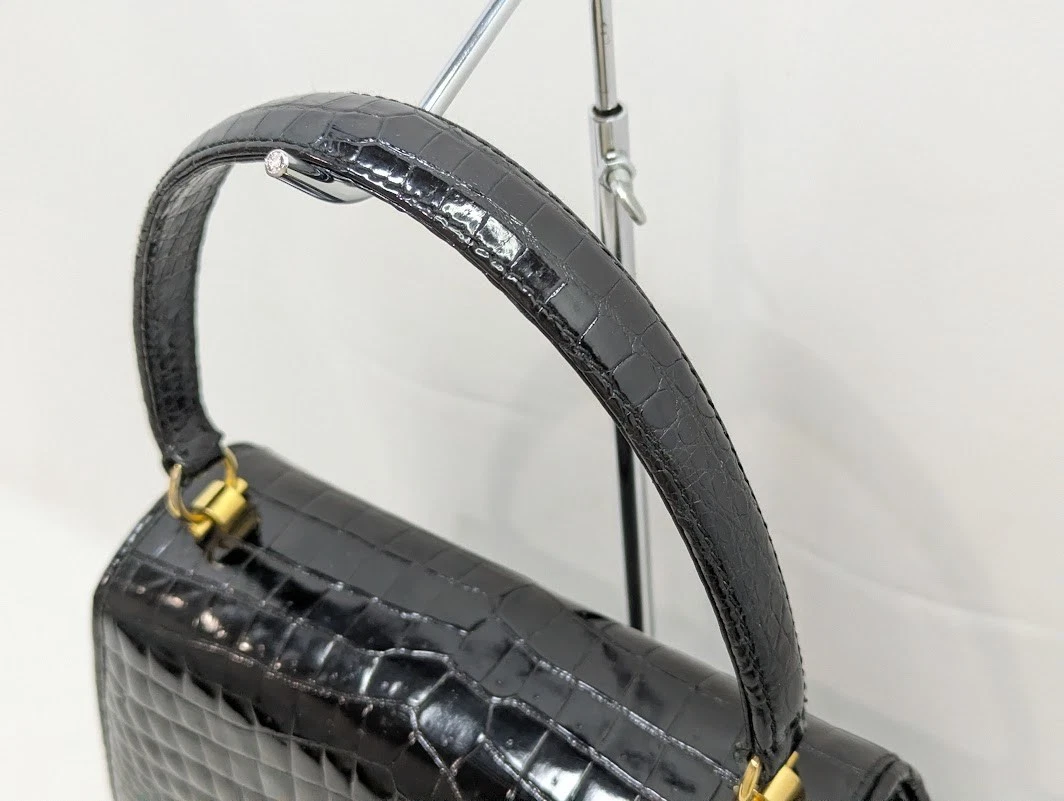 Gucci black crocodile boxy satchel with a red and blue enamel G clasp
