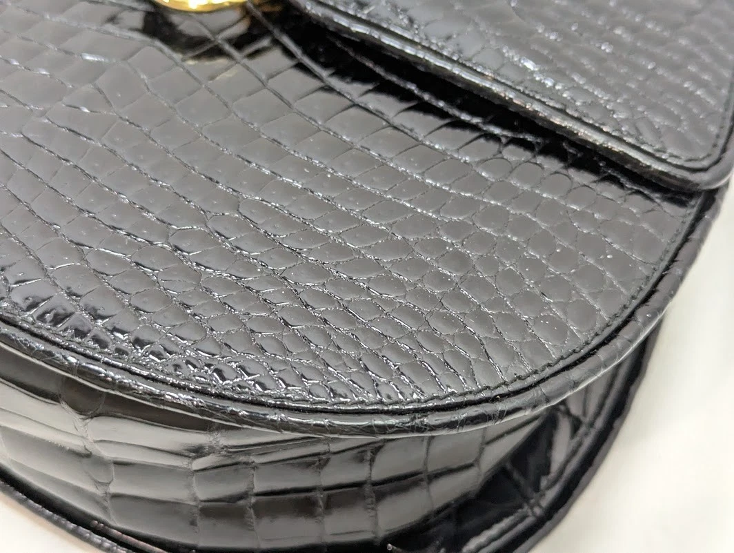 Gucci black crocodile boxy satchel with a red and blue enamel G clasp