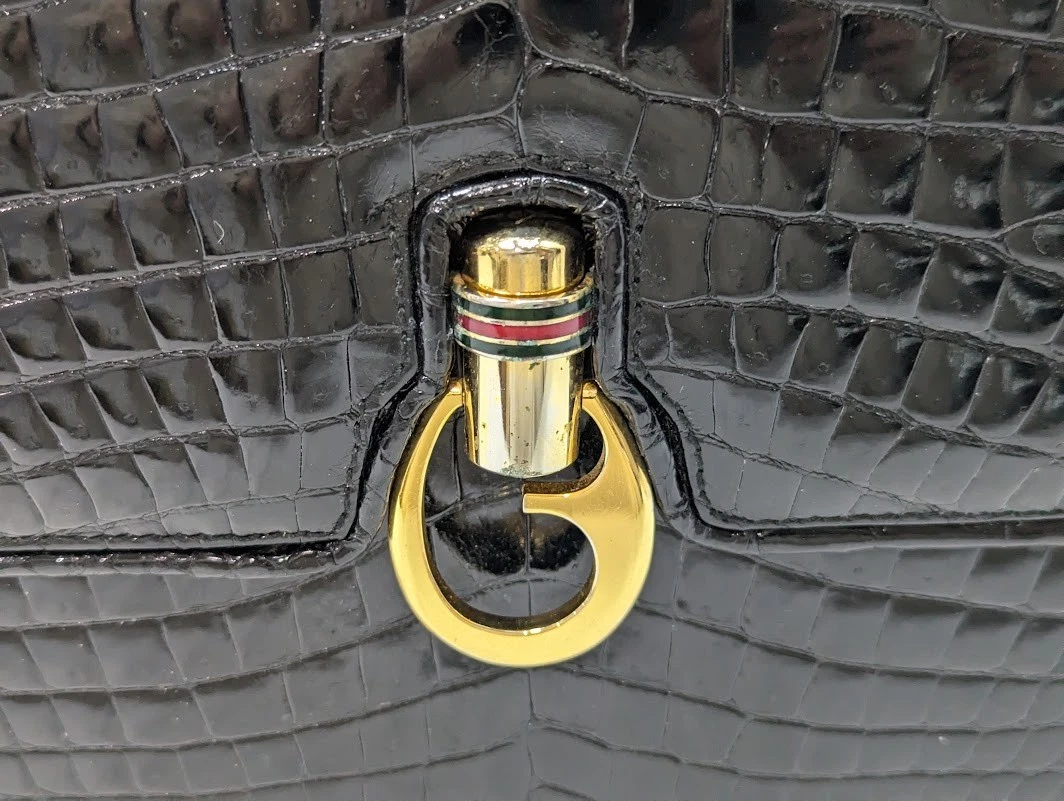 Gucci black crocodile boxy satchel with a red and blue enamel G clasp