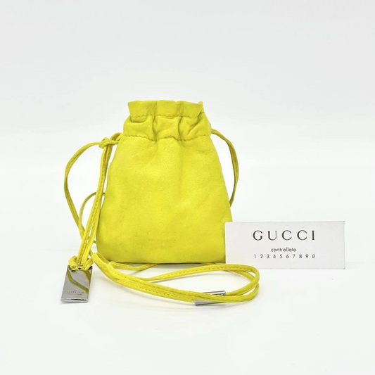 Gucci Tom Ford era yellow leather drawstring top pouch w silver Gucci dog tag