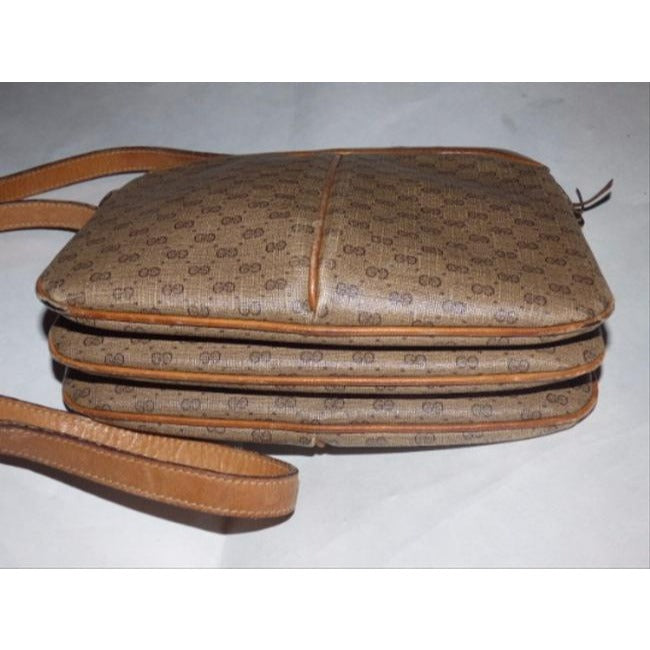 Gucci, brown micro Guccissima print coated canvas and camel leather cross body or shoulder bag with a zip top closure