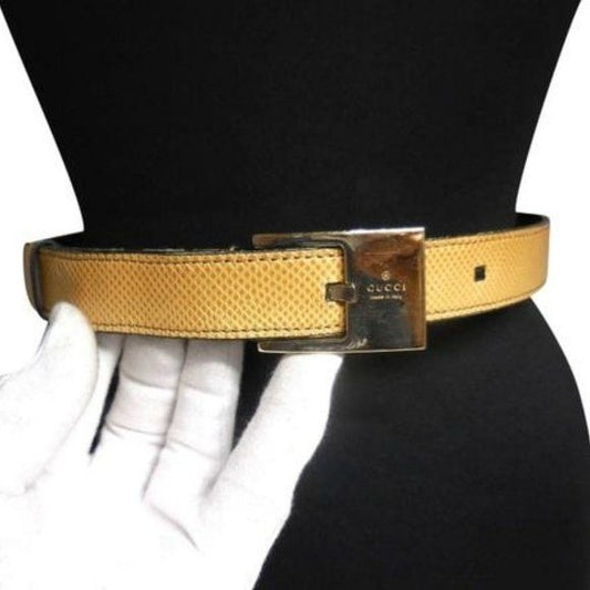 Gucci tan lizard leather belt w engraved chrome buckle