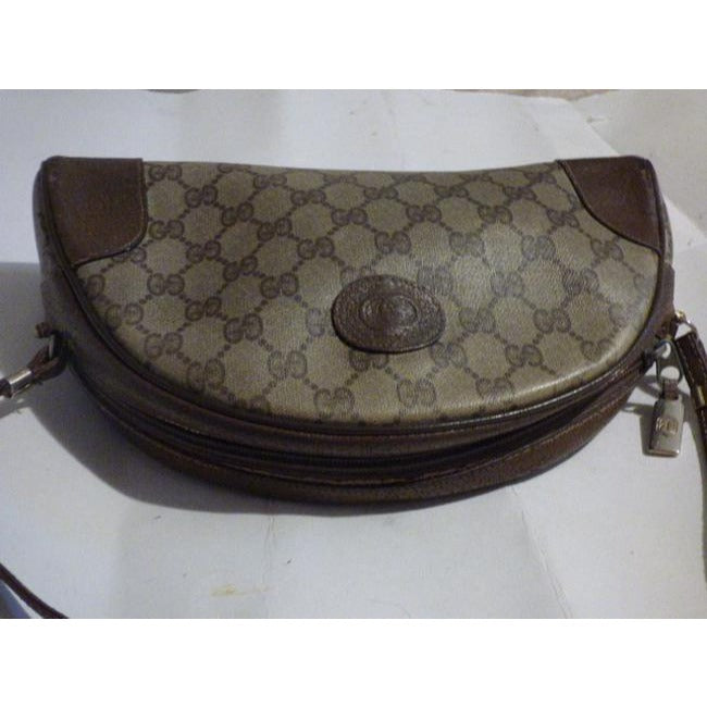 Gucci Vintage RARE, brown Guccissima print coated canvas and brown leather, top zip, hobo style, crescent shaped, shoulder bag with gold hardware