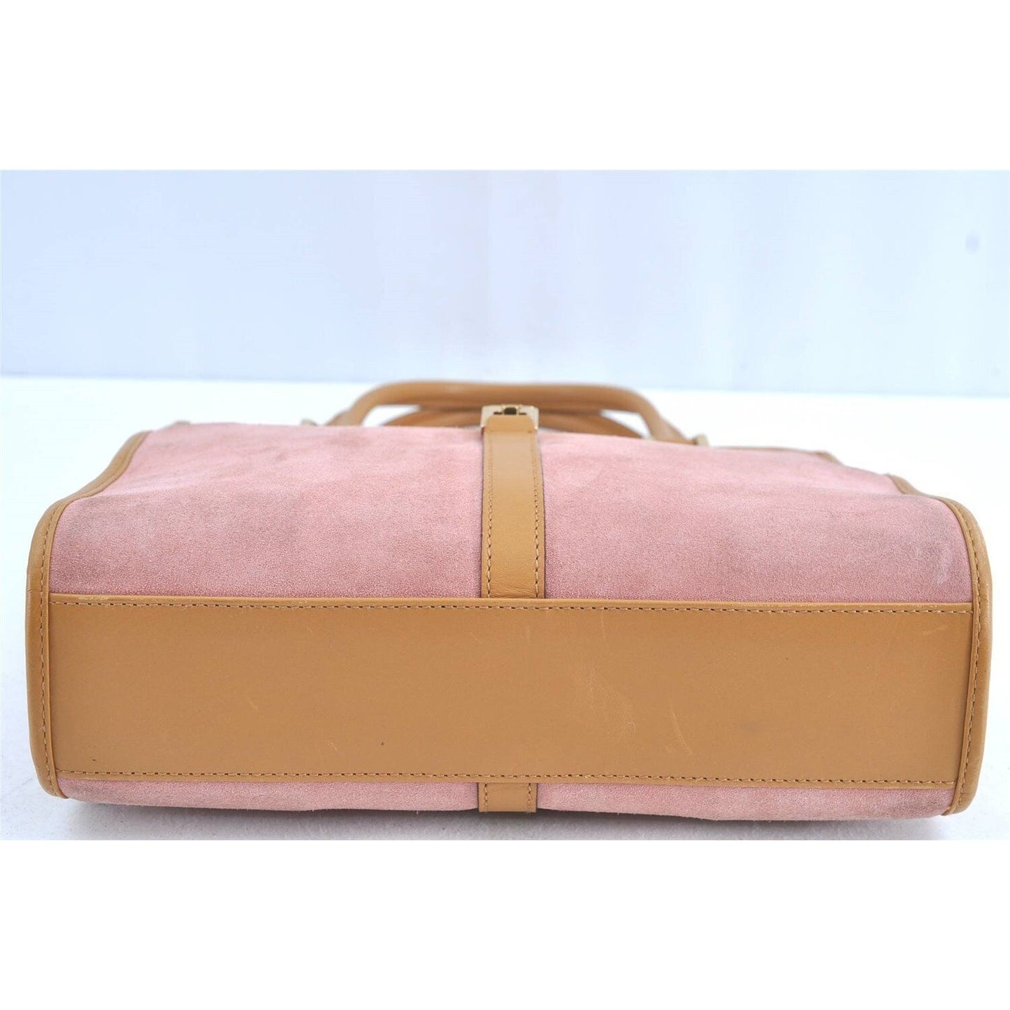 Gucci, pink suede and camel leather, Jackie bag with two, rolled leather handles, a chrome, push button closure and flip top closure