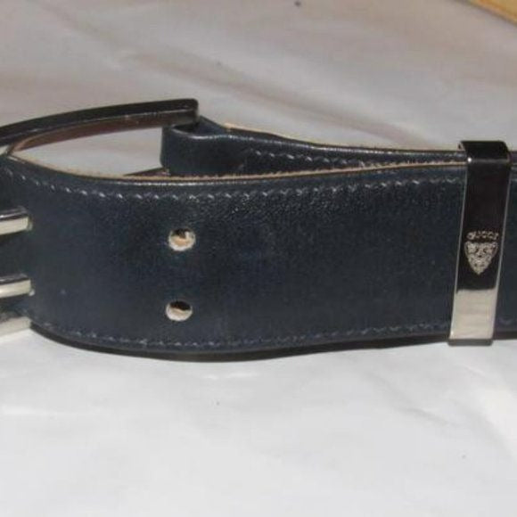 Early Gucci, navy leather belt w embossed Gucci logo print