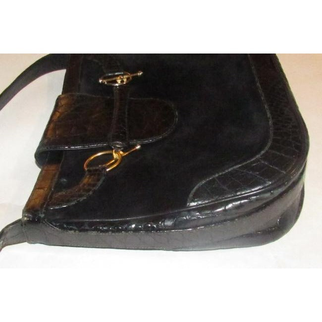 RARE, Gucci, 'snaffle' style, bohemian/mod, black suede and crocodile leather, hobo style shoulder purse with a wide, crocodile embossed leather flap snap closure and gold tone equestrian accents