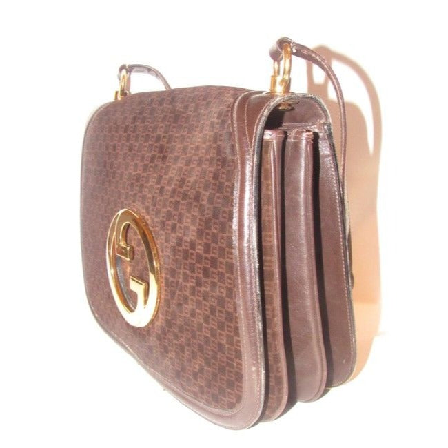 Gucci Blondie, brown square G logo print suede and brown leather, saddle bag style, shoulder bag with large, gold 'GG' cut-out