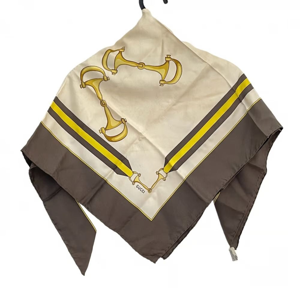 Vintage, Gucci, equestrian print, 35" square, 100 % silk scarf in brown, gold, & black on a white background with a wide brown border