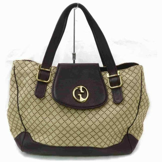 Gucci, brown on tan diamante print canvas and brown leather, XL '1973' top handle shoulder bag with a bold gold GG accent