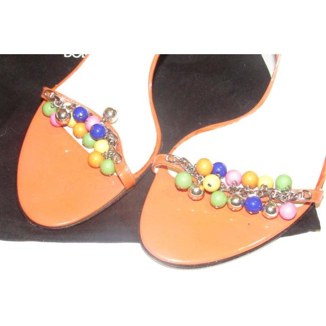 Dolce & Gabbana, new/unworn, dressier, strappy sandals or heels made of tangerine orange leather with colorful beads